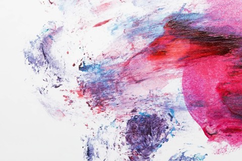 Colorful paint scattered white background