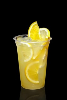 Cold Lemon cocktail with a sparkling wine with ice cubes in take away glass isolated on black