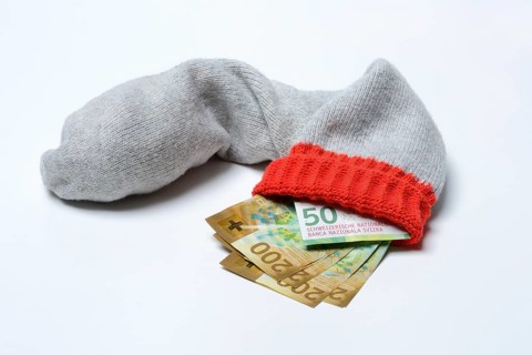 Banknotes in woollen sock