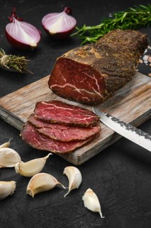 Beef jerky on wooden cutting board