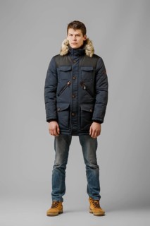 Full length portrait of handsome man in warm winter coat posing in studio