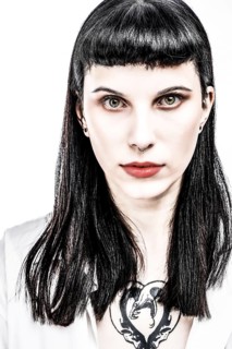 Portrait young woman with long black hair