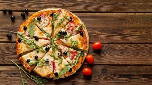 Delicious italian pizza wooden table