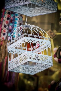 Little white bird house made of metal