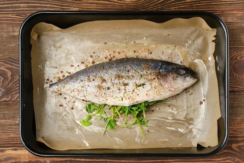 Fresh sea yellow tailed horse mackerel in baking tray
