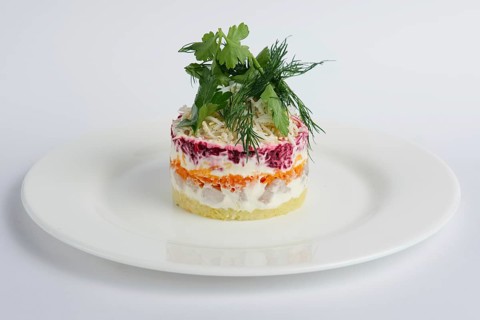 Traditional russian salad herring with beetroot