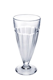 Empty faceted coffee cocktail glass