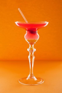 Scofflaw cocktail on orange background