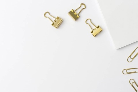 Top view golden paperclips with copy space. Resolution and high quality beautiful photo