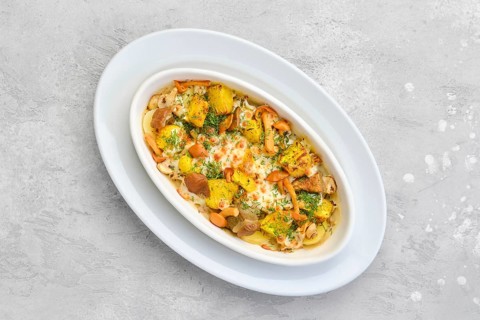 Overhead view of hot casserole with honey agarics