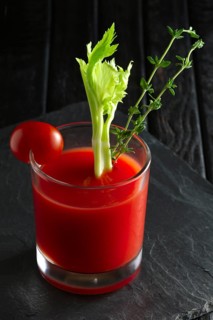 Cocktail Bloody Mary on dark wooden background