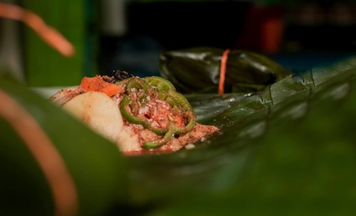 Nacatamal ingredients on banana leaves