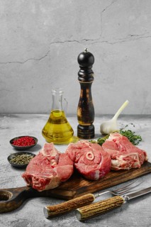 Raw lamb leg steak chump off. Slices of lamb shank