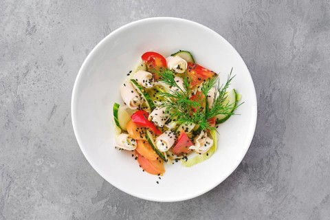 Top view of salad with ham