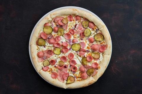 Top view of pizza with frankfurter