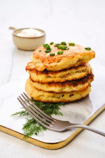 Potato pancakes stuffed with chopped salmon meat