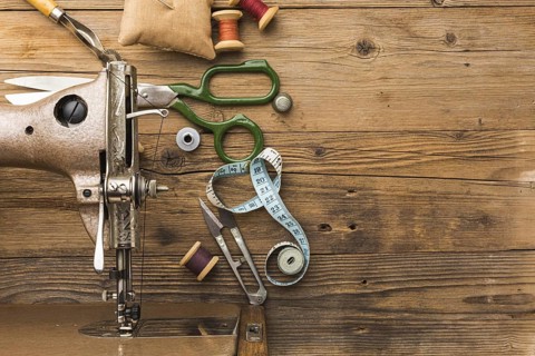 Top view of vintage sewing machine with scissors and thread. Resolution and high quality beautiful photo