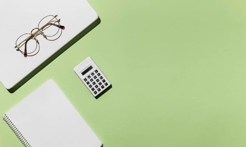 Top view desk minimal glasses calculator. Resolution and high quality beautiful photo