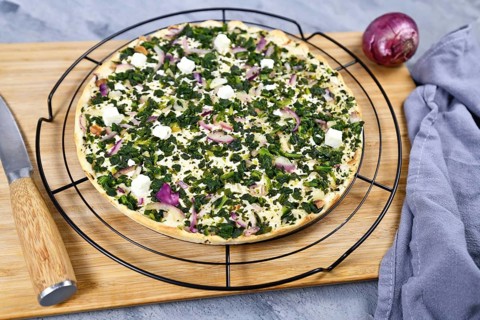 Tarte Flambee or Flammkuchen a thin pizza-like baked pie from German-French Alsace border region
