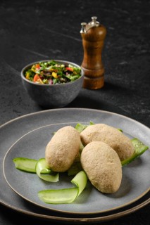 Semifinished frozen cepelinai. Potato dumplings stuffed with ground meat