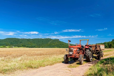 Old tractor on a field path