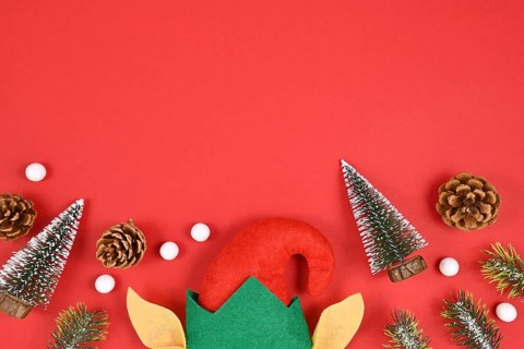 Seasonal flat lay with Christmas elf hat and ears