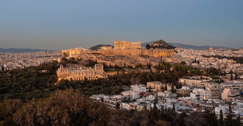 View from Philopappos Hill over the city at sunset