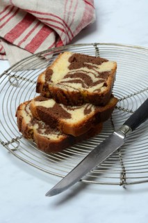 Marble cake and knife on cake rack
