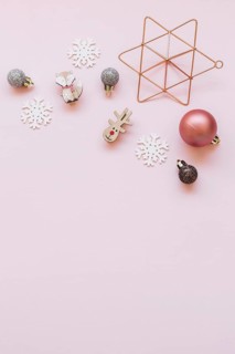 Small christmas toys pink table. Resolution and high quality beautiful photo