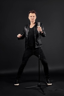 Full length portrait of singing artist