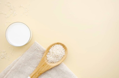 Top view rise spoon with milk copy space. Resolution and high quality beautiful photo