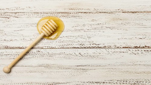 Top view spoon with honey stain. Resolution and high quality beautiful photo