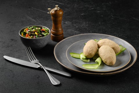 Semifinished frozen cepelinai. Potato dumplings stuffed with ground meat