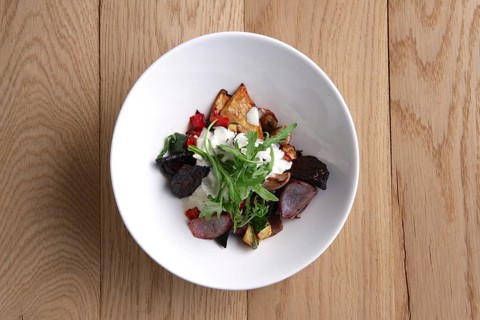 Top view of hot salad with deep fried beetroot