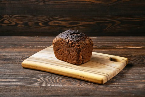Loaf of artisan rye bread on a table