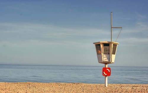 Rescue tower on the empty beach of the seaside resort of Dahme
