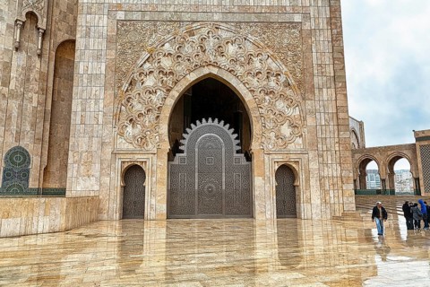 Pedestrians in the courtyard of the Hassan II Mosque