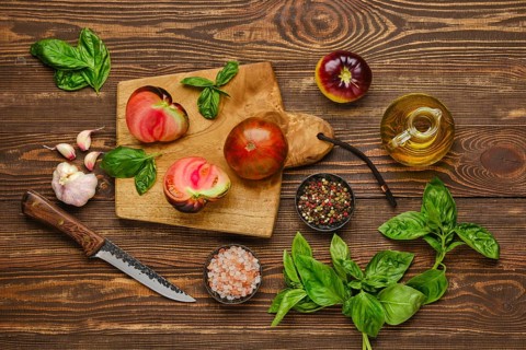 Top view of preparation of spicy tomato salad