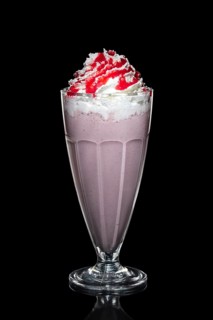 Strawberry milk cocktail with whipped cream