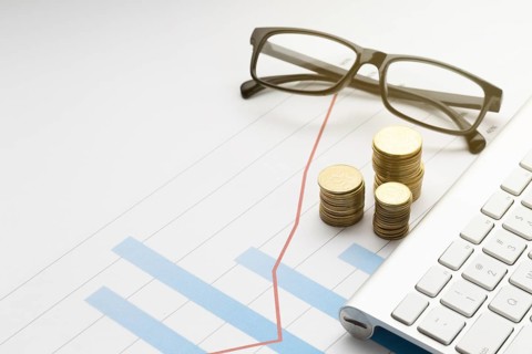 Coin pile near glasses
