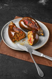 Aubergine filled with meat baked in oven