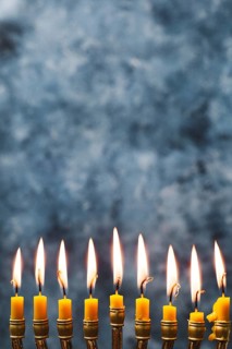 Close up holly candles burning