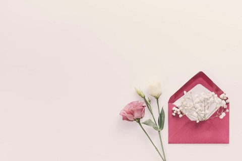 Red envelope with flower branches table