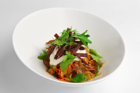 Deep plate of salad with bean