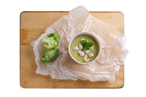 Soup puree with broccoli in cardboard cup