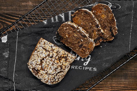 Overhead view of artisan rye bread with dried apricots