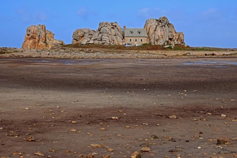 Country house between rocks near Le Gouffre