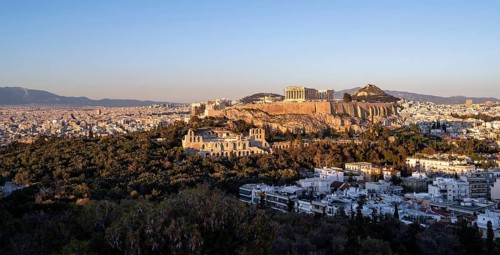 View from Philopappos Hill over the city at sunset
