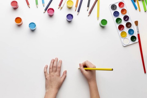Flat lay colorful aquarelle with copy space