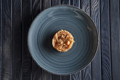 Top view of plate with onion marmalade. Candied onion jelly